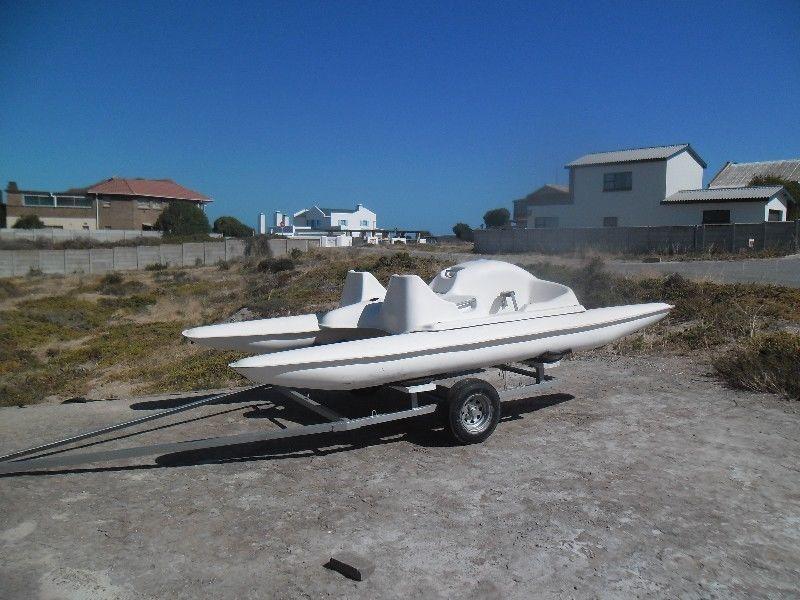 pedal boat and trailer R 9 000 . 00