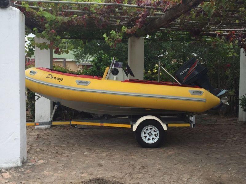 Semi-ridged boat with trailer