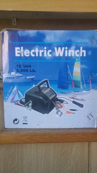 portable 12 volt electric winch for small boat or jetski, still in its box only used twice