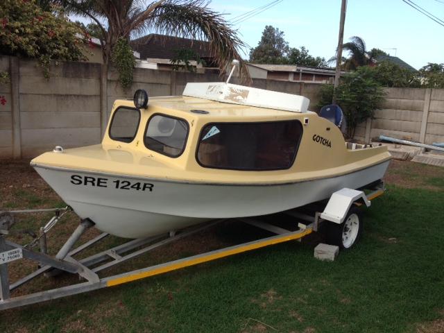 Cabin boat with galvanised trailer