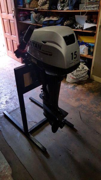 Titan 15 HP outboard motor