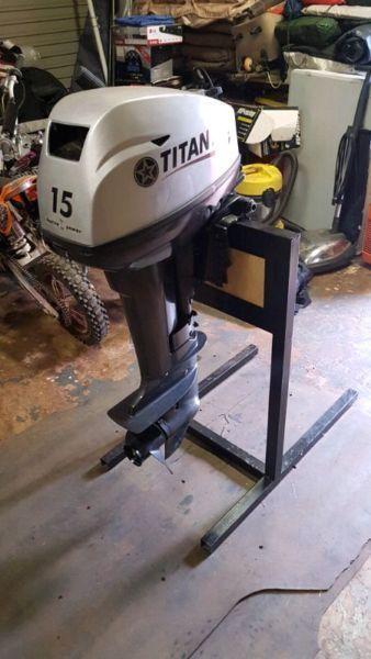 Titan 15 HP outboard motor