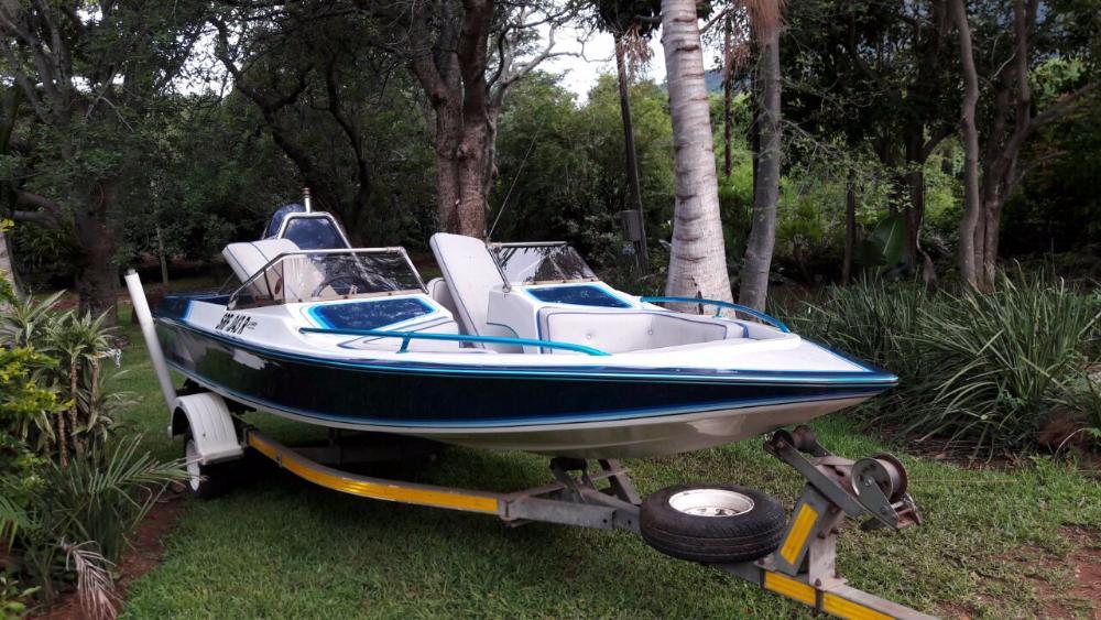 Boat and motor and trailor for sale