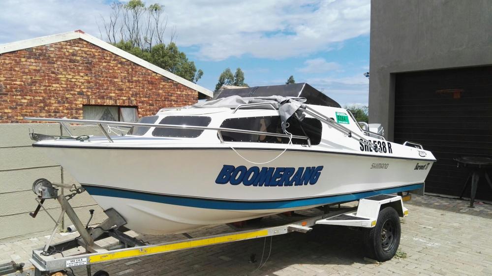 Cabin Baronet boot met 60hp Mariner Bigfoot