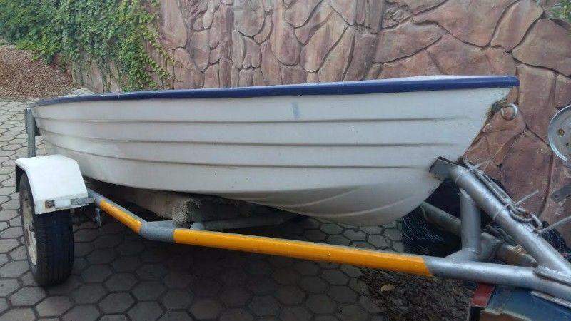 Small Boat on Galvanized licensed Trailer