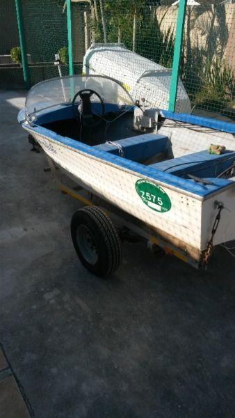 open boat with 15 evinrude motor