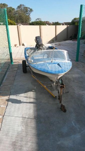 open boat with 15 evinrude motor
