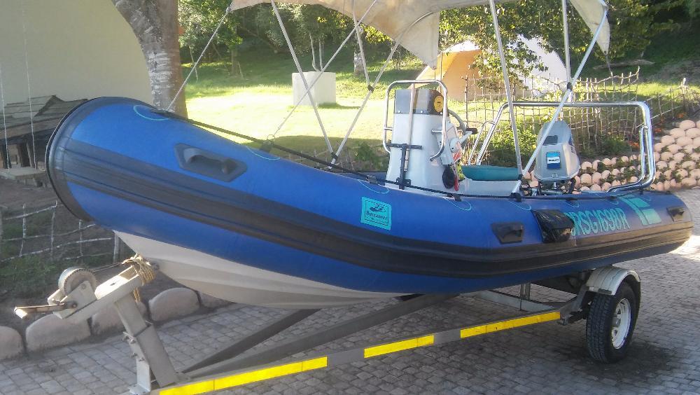 Very Neat and Tidy Suzuki Hard-bottom dinghy for sale!