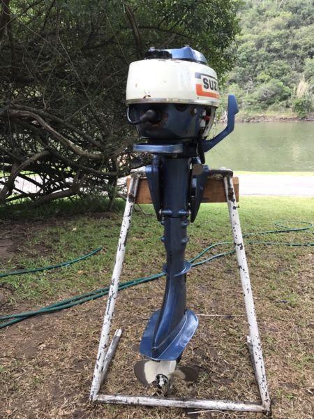 Outboard motor for a small riverboat