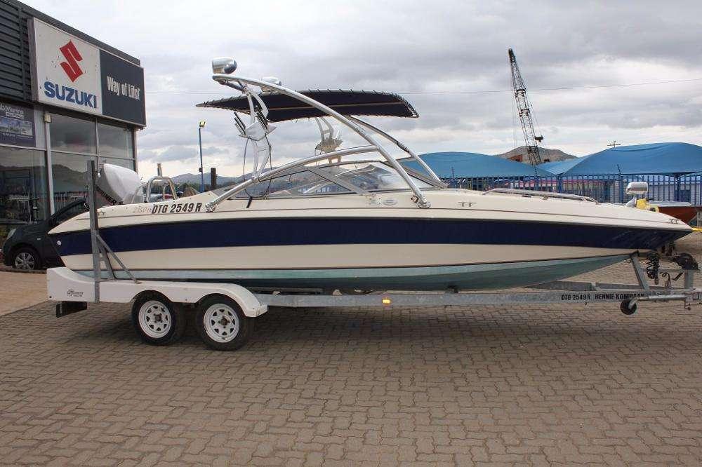 2150 Panache on trailer with 225 Hp Optimax engine