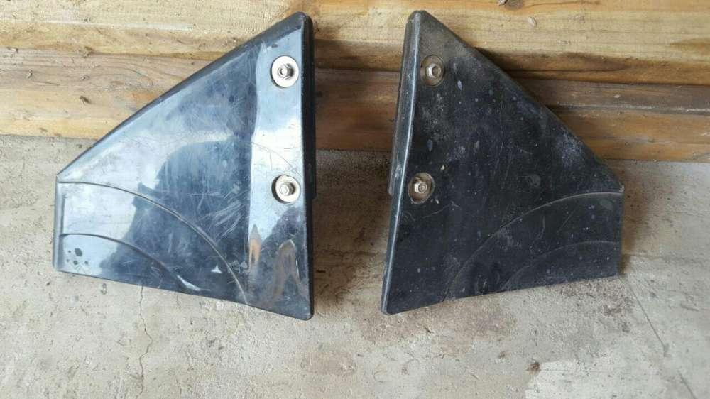 Boat motor side fins