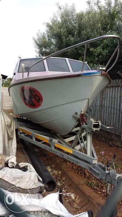 Boat with trailer and accesoriea