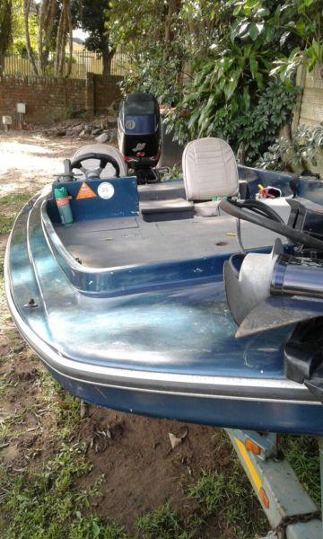 Bass fishing boat with motor, trailer and plenty fishing gear