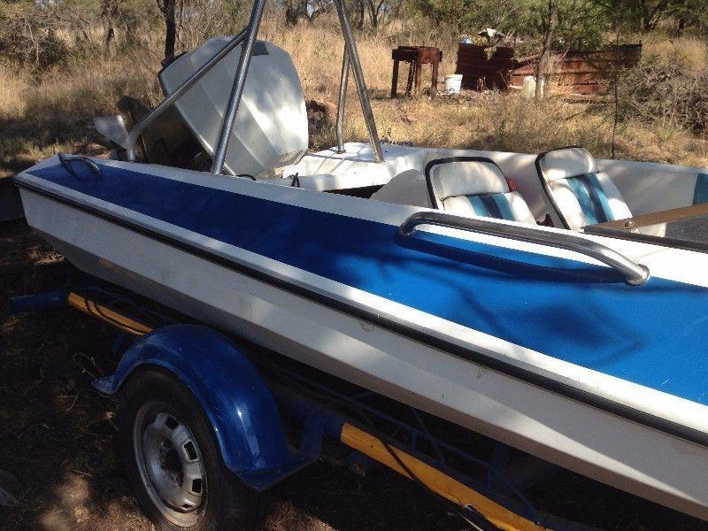 Ski Boat and Trailer with 85HP Evirude