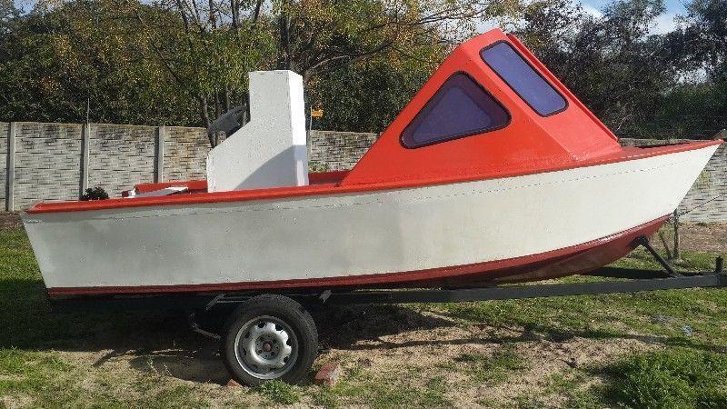Boat on trailer and Suzuki engine for sale