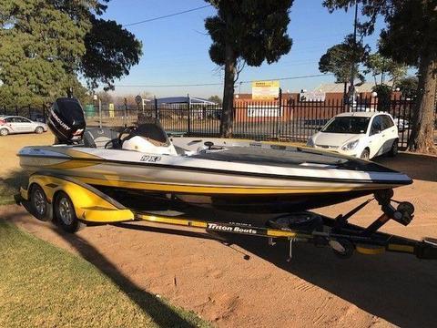 Triton 19x2 with 300 Mecury Optimax Bass Boat