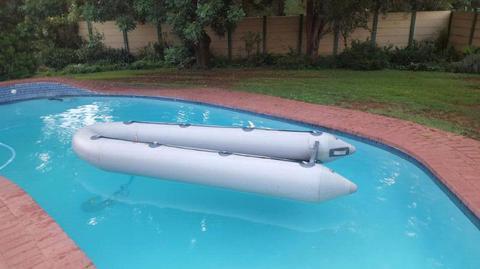 Inflatable boat and outboard
