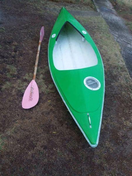 Fishing kayak with paddle
