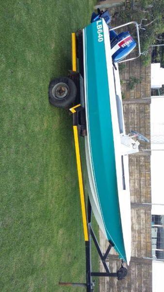 Boat and 25 Yamaha
