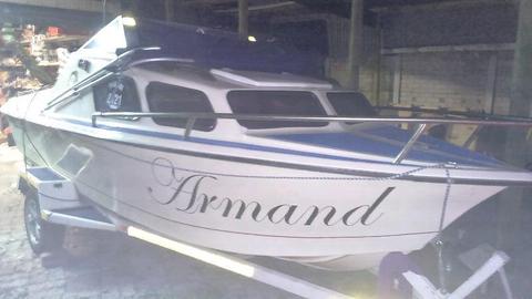 Caliber Boat with 90 Motor
