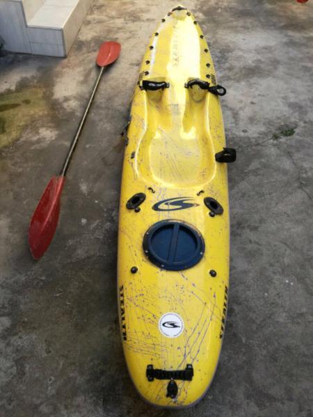 Stealth surfa kayak with paddle at a GREAT PRICE