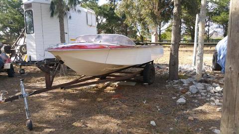 Speed boat on trailer