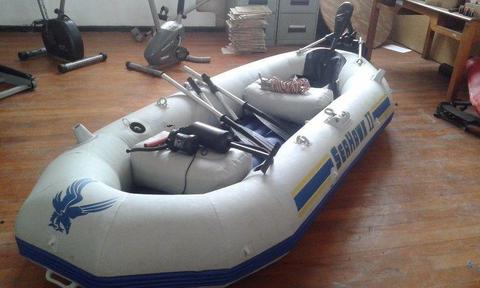 Inflatable boat with motor bracket and electric motor for sale
