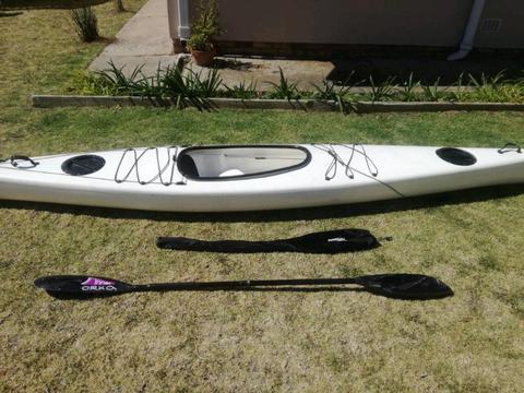 Sea kayak and carbon paddle