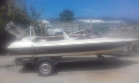 90 hp mariner with ski boat and trailer