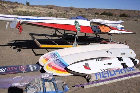 Canoe’s, sea kayaks and windsurfers with trailer for sale