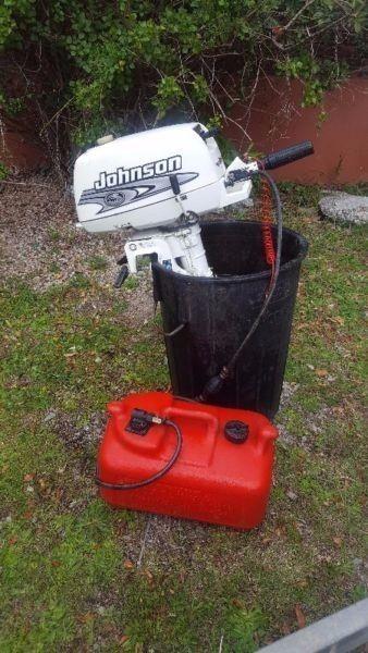 Johnson 5 Hp outboard in new condition with petrol tank connected