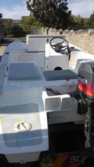 5 metre Twin hull wet deck boat with motor and trailer
