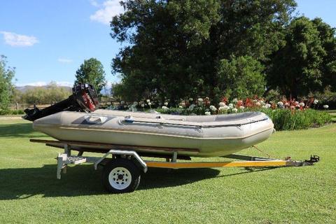 Rubberduck with 9.9Hp Mercury outboard engine on trailer