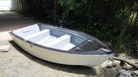 2-3 man boat with electric motor. Inside of boat was recently fiberglassed