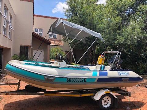 Excellent condition 5.1 Meter Prestige Rubberduck with 115 HP Evinrude Engine