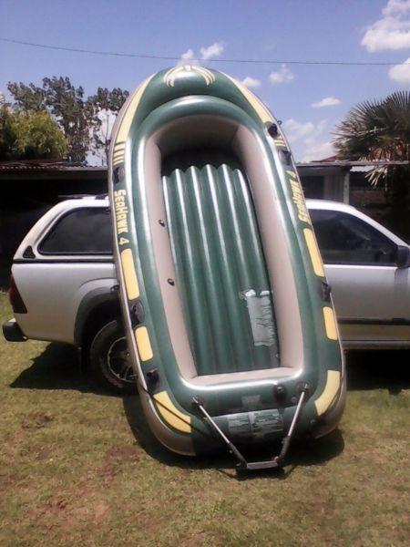 Rubber boat with motor holder