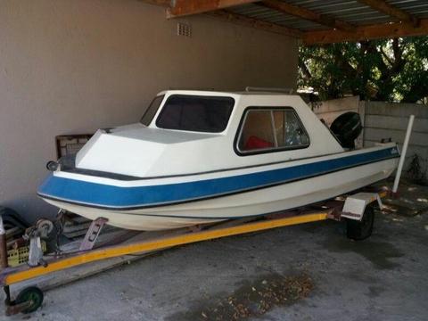 Viking cabin boat on trailer