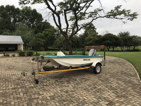 3.9M boat with 50HP Evinrude engine. Incl trailer and cover