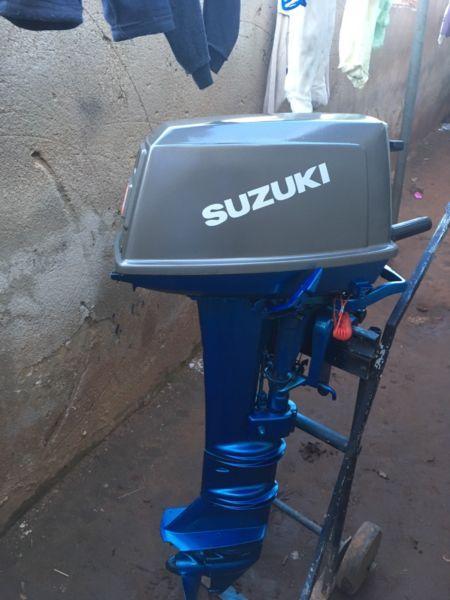 Selling 9.9hp Suzuki outboard motor long shaft