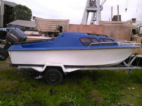 Cabin boat with 75hp mariner for sale