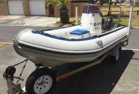 4.5m inflatable with 2x 30HP Yamaha outboard motors on a roadworthy trailer