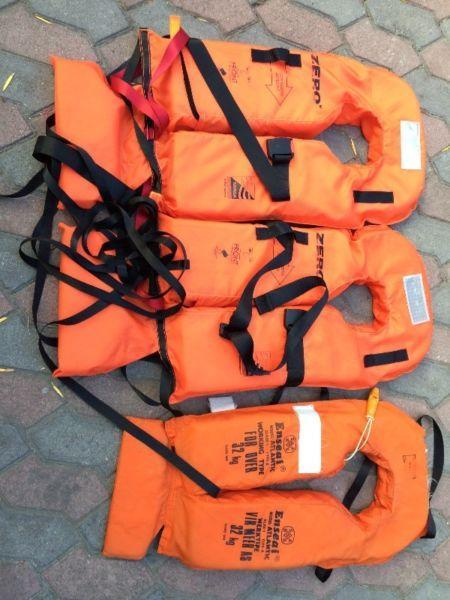Boat Anchor, Life Jackets, a Buoy & a Capsize Container Bracket