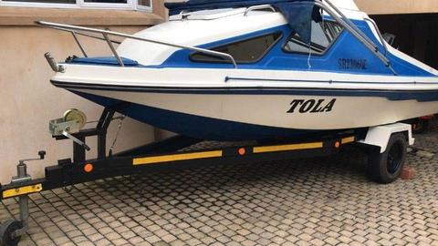 Cabin Boat and Trailer with 90hp Motor