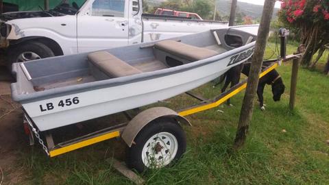 Nice river boat, trailer and 2hp Yamaha motor