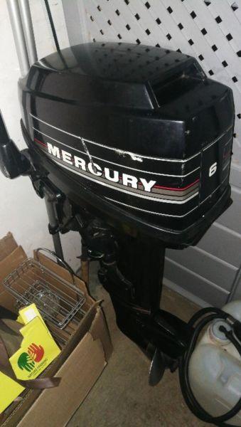 6foot crusader inflatable rubber duck with pull up shade canopy with a 6hp mercury outboard motor