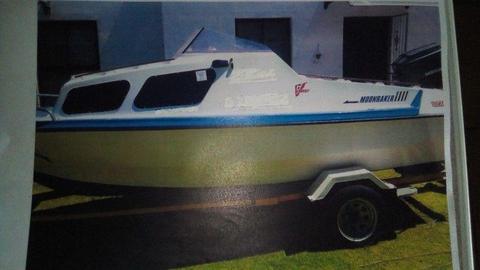 moonraker boat and 2 rubber ducks