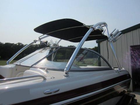 BOAT WAKE AND SKI TOWERS