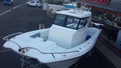 Titan 255 WA (Extended) with Yamaha F115 four stroke Outboards on trailer