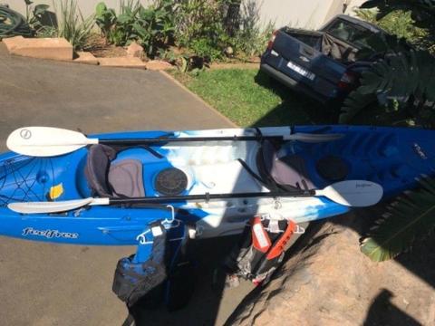 Gemini kayak, two Ores and two life saving jackets