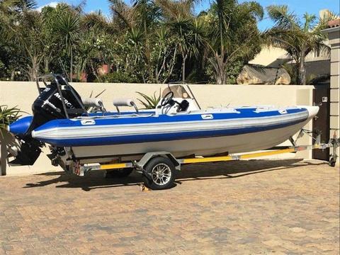 7M Falcon with 200HP Mercury Optimax